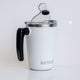 Outsider White Insulated Stainless Steel Travel Coffee Cup with rotating handle side view with lid